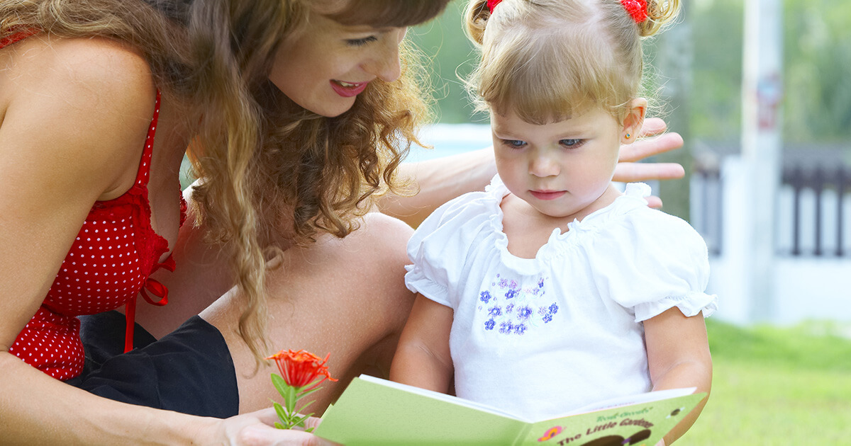 Mom and girl reading spring_1200x630