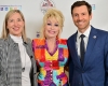 Dolly Parton with the Dollywood Foundation's Nora Briggs & Jeff Conyers