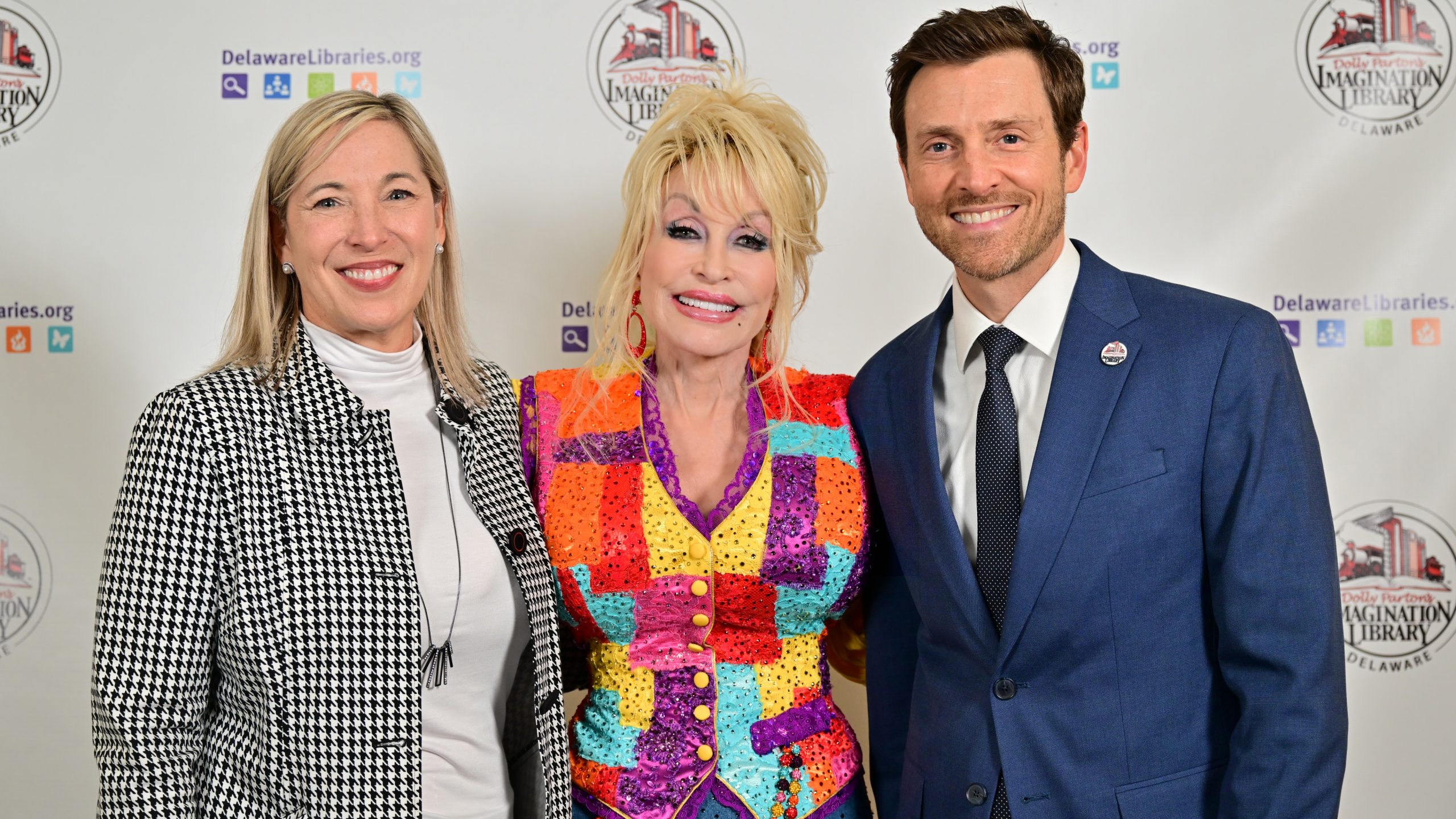 Dolly Parton with the Dollywood Foundation's Nora Briggs & Jeff Conyers